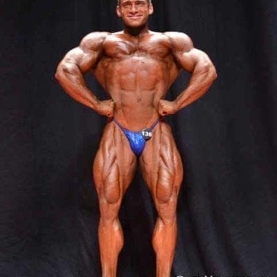 Competition Signed 8×10 Front Lat Spread