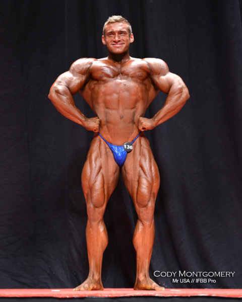 Competition Signed 8×10 Front Lat Spread